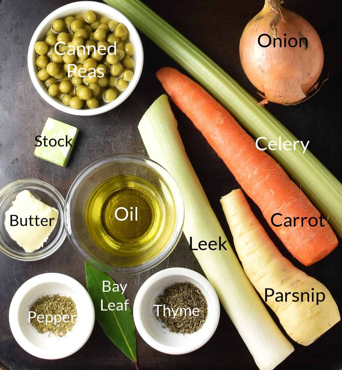 Ingredients for making canned pea soup on top of metal surface.