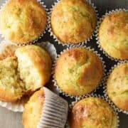 Top down view of lime muffins in paper cases close together.