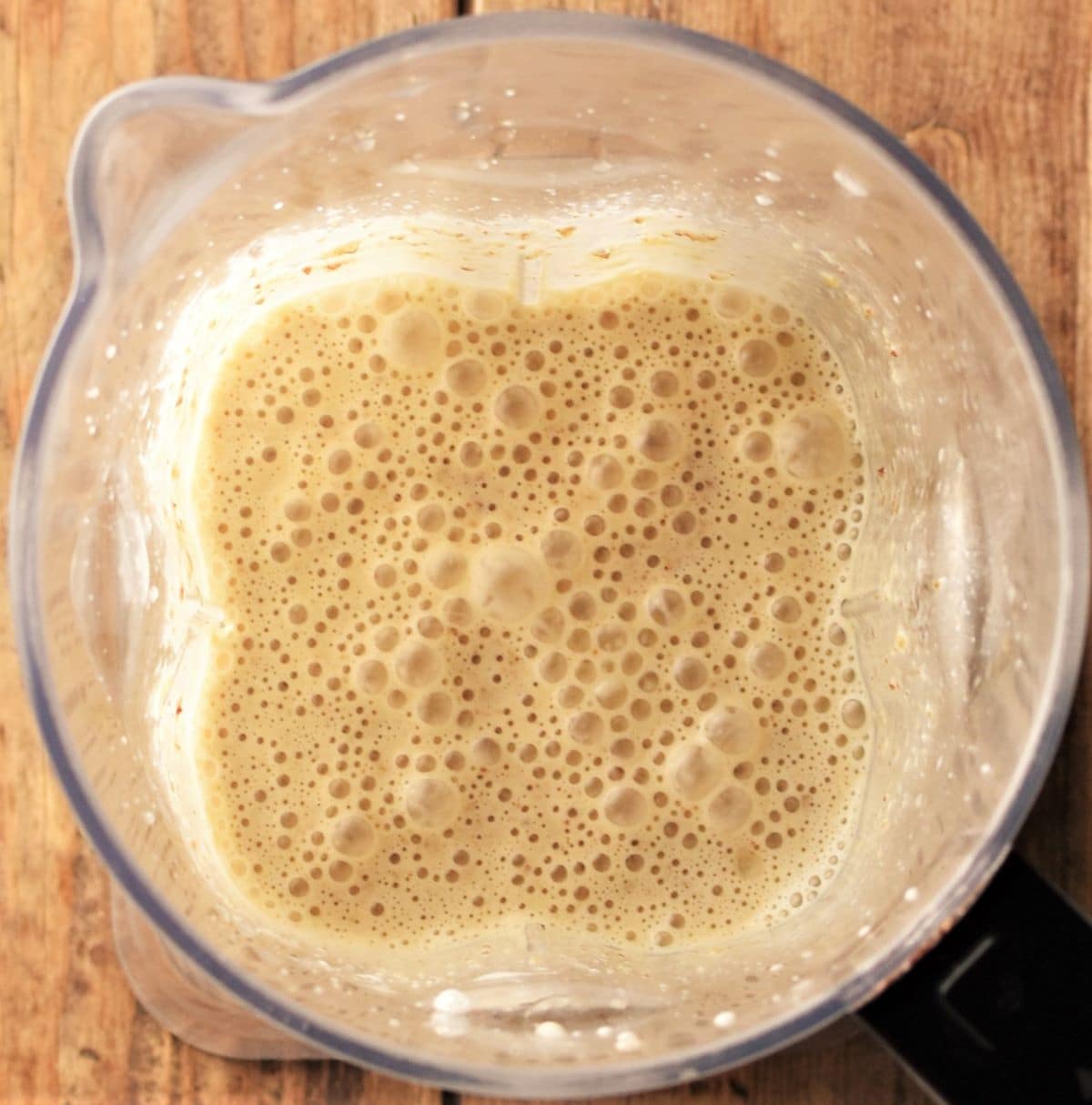 Wet mixture in blender for carrot muffins.