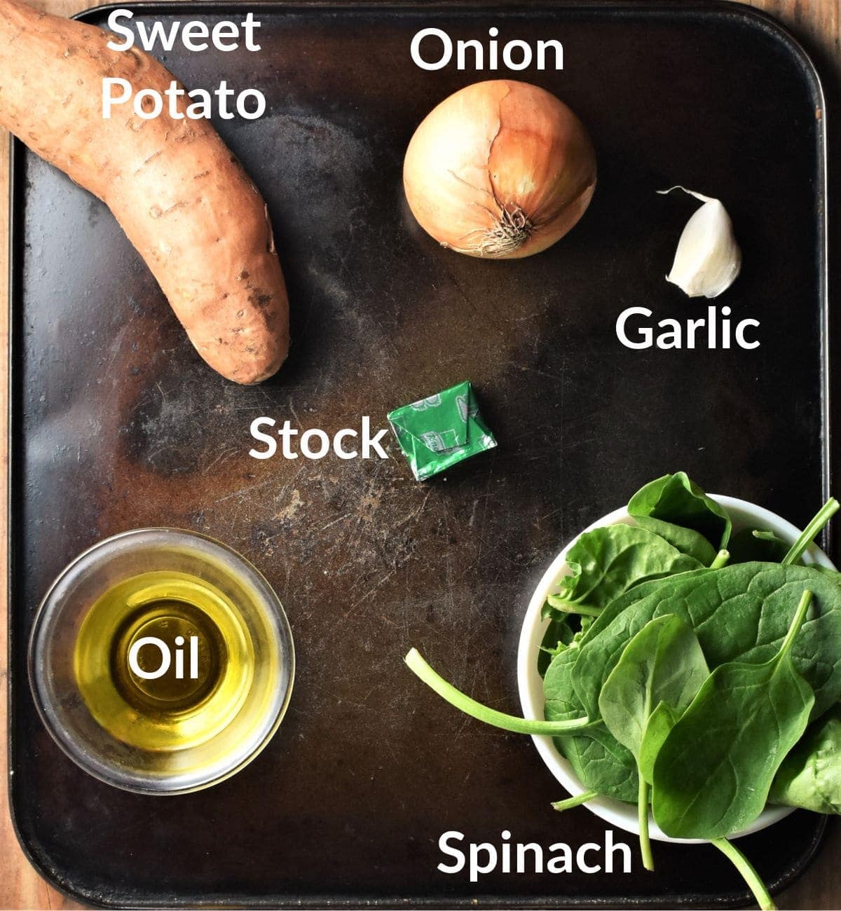 Roasted sweet potato soup ingredients in individual dishes.