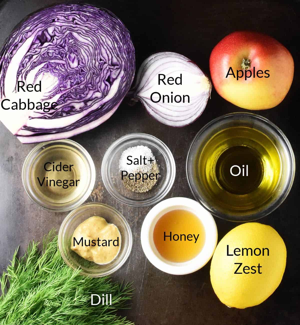 Ingredients for making red cabbage and apple slaw in individual dishes.