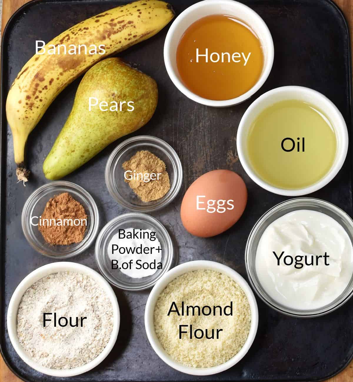 Ingredients for making banana and pear bread in individual dishes.