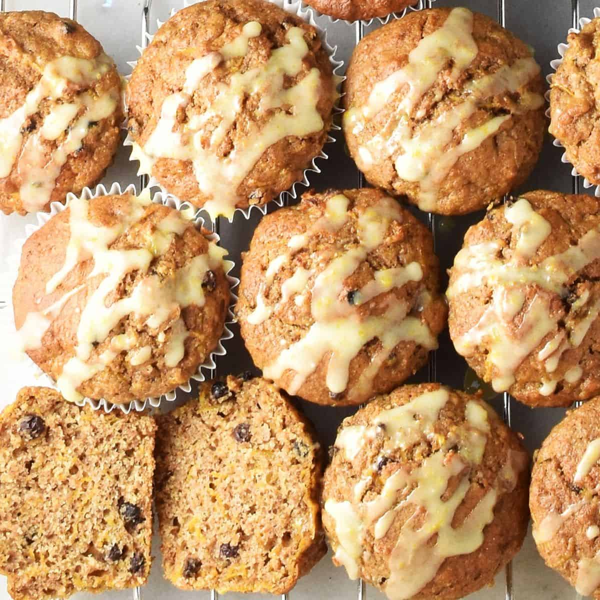 Top down view of cluster of butternut squash muffins with orange drizzle.