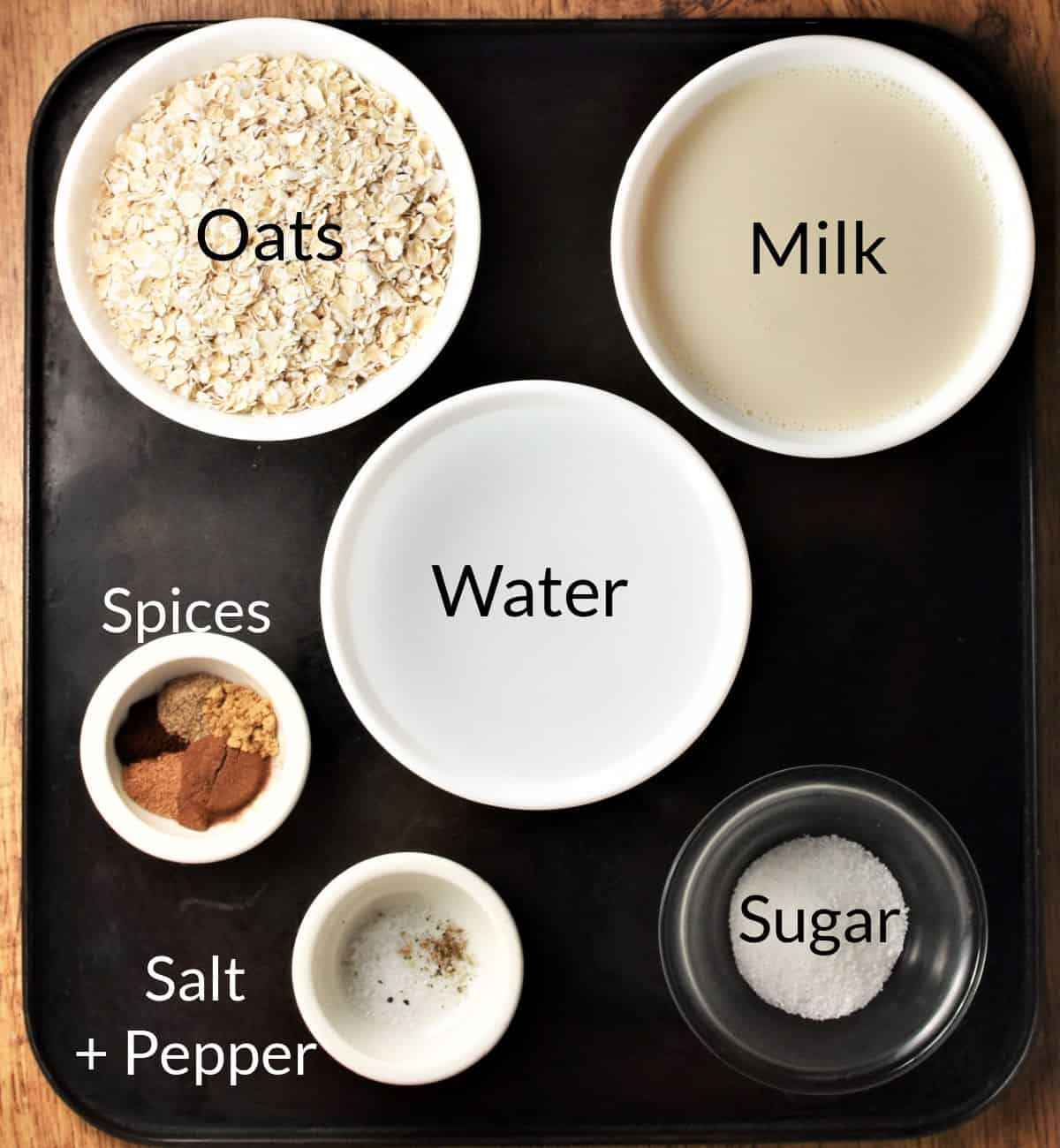 Ingredients for making chai oatmeal in individual dishes.