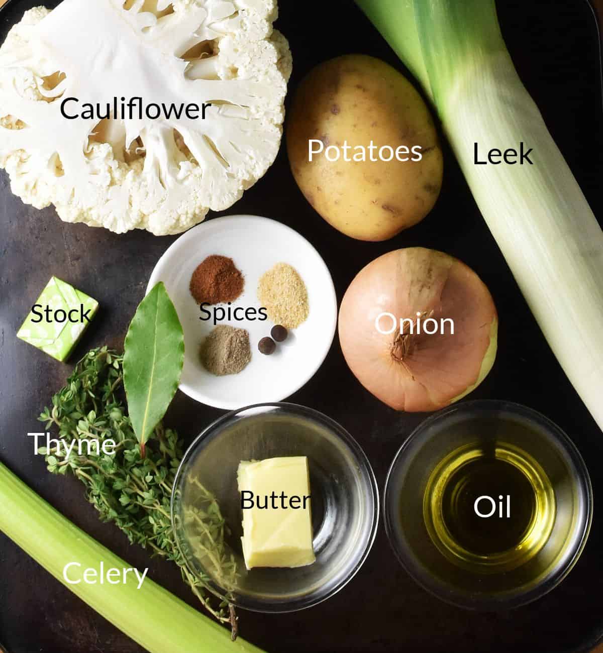 Cauliflower leek potato soup ingredients in individual dishes and labelled.