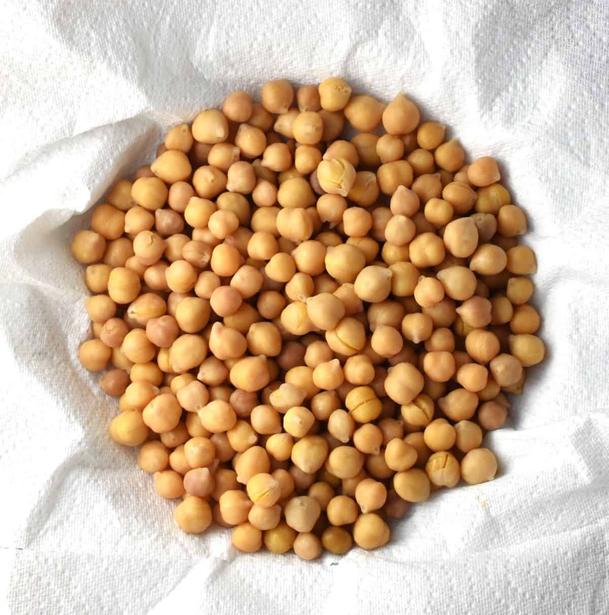 Top down view of chickpeas on top of paper towel.