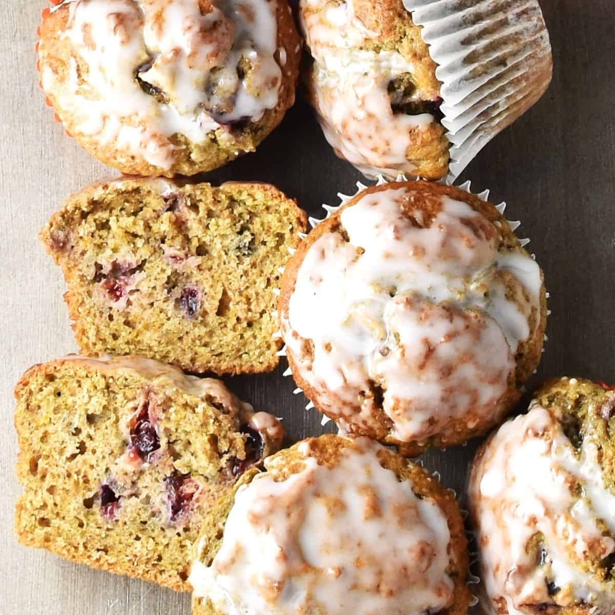 Top down view of blood orange muffins with glaze.
