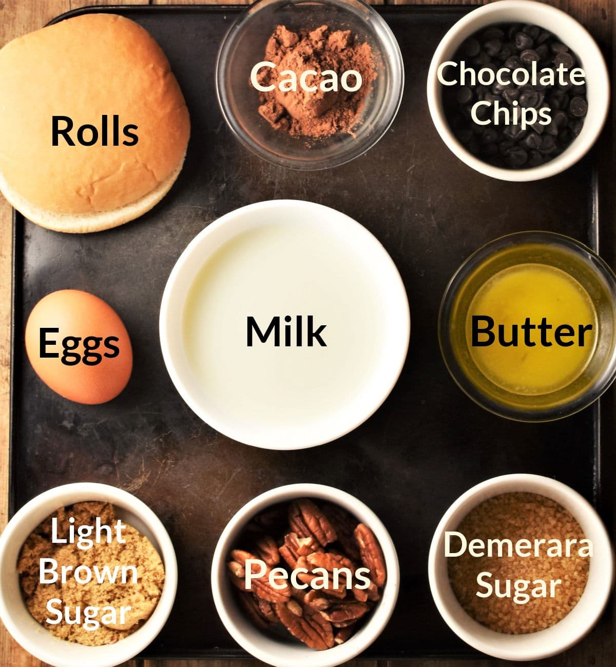 Ingredients for making chocolate french toast casserole in individual dishes.