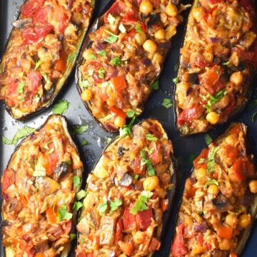 Top down view of vegan stuffed eggplant halves.