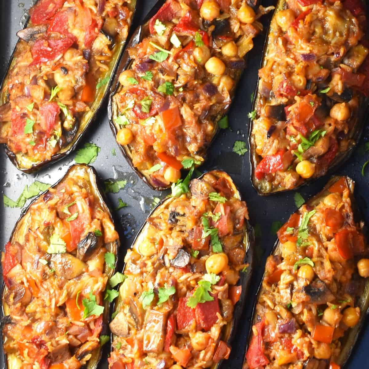 Top down view of vegetarian stuffed eggplant halves.