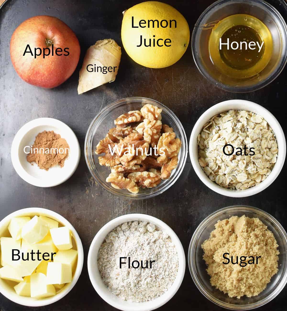 Ingredients for making low sugar apple crumble/crisp in individual dishes.