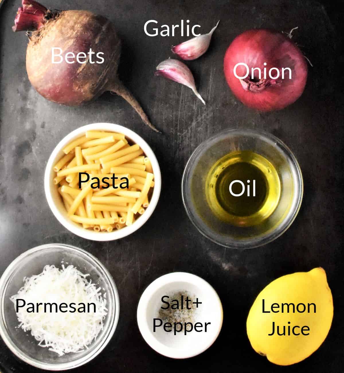 Ingredients for making pasta with beets in individual dishes.