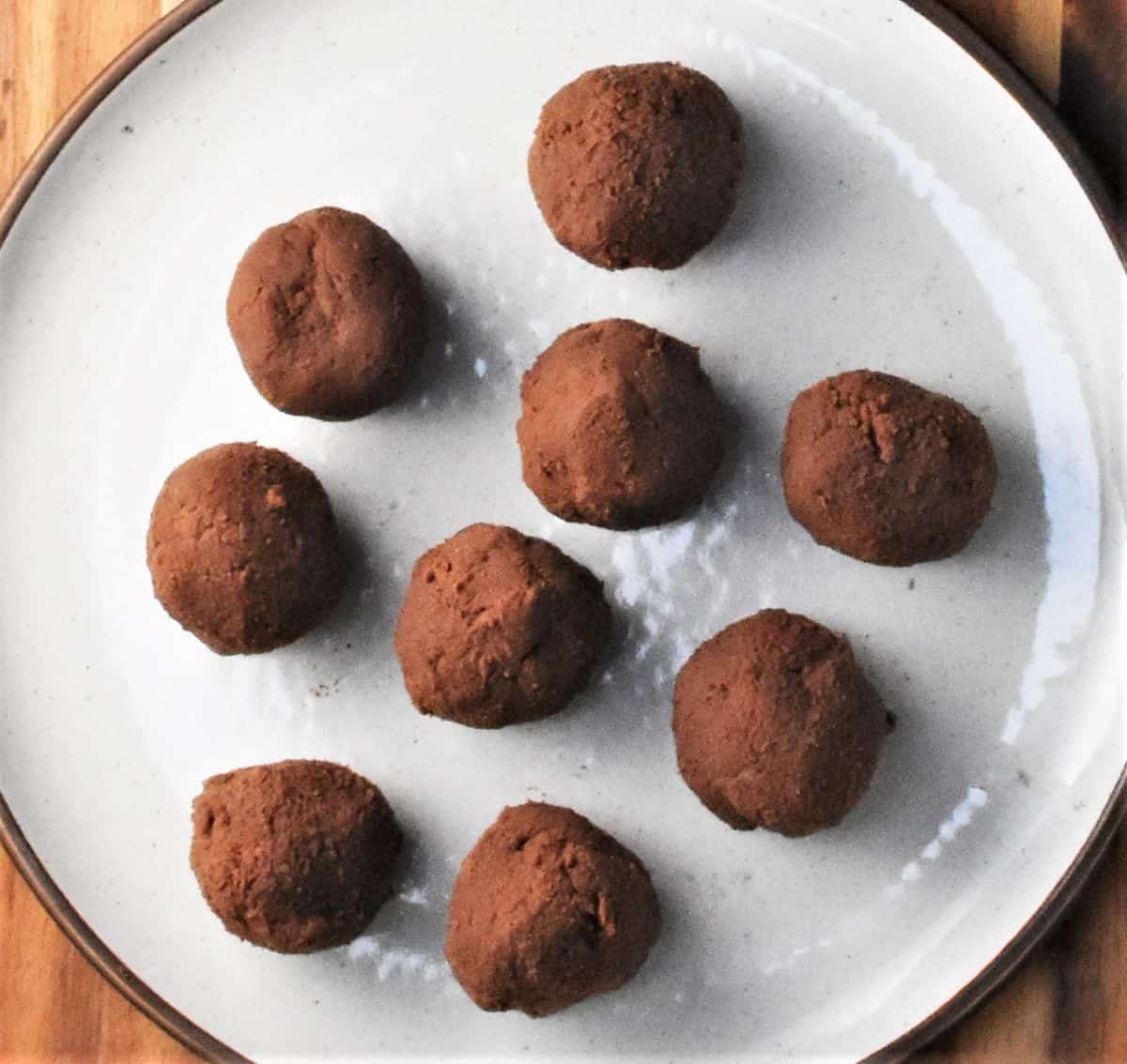 Truffle balls on top of plate.