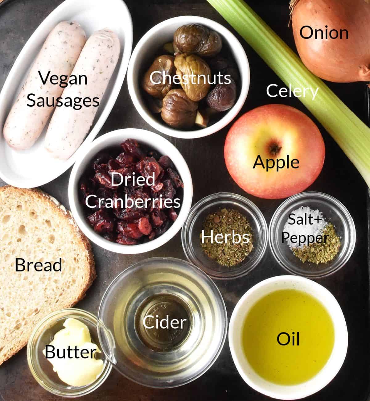 Top down view of ingredients for vegan Christmas stuffing in individual dishes.