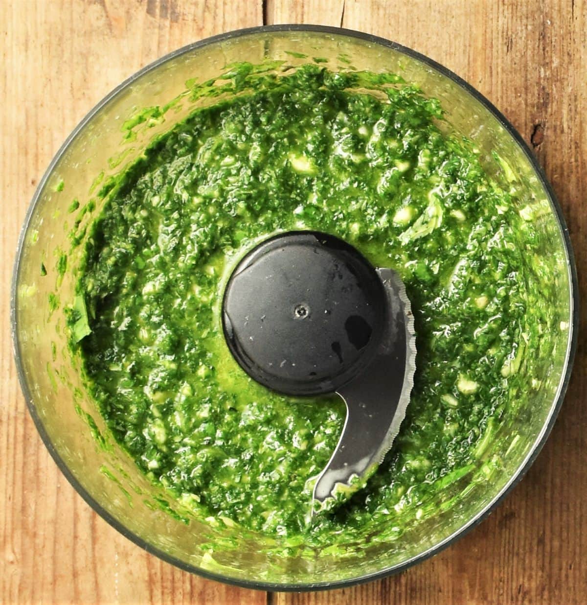 Pesto sauce in food processor bowl.