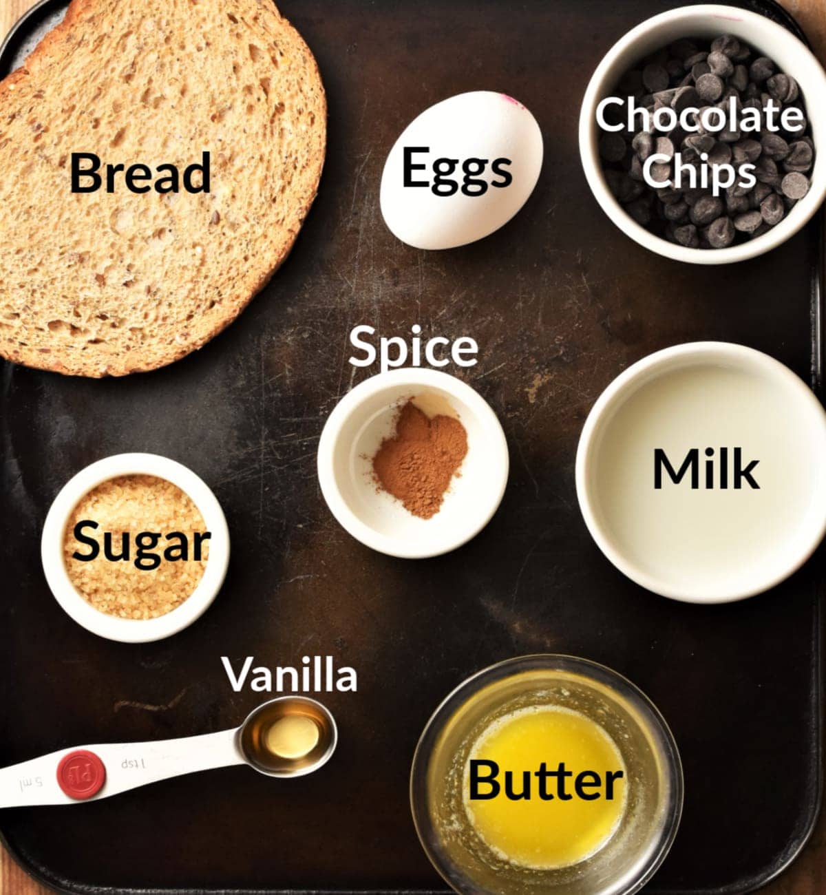 Ingredients for making french toast muffins in individual dishes.
