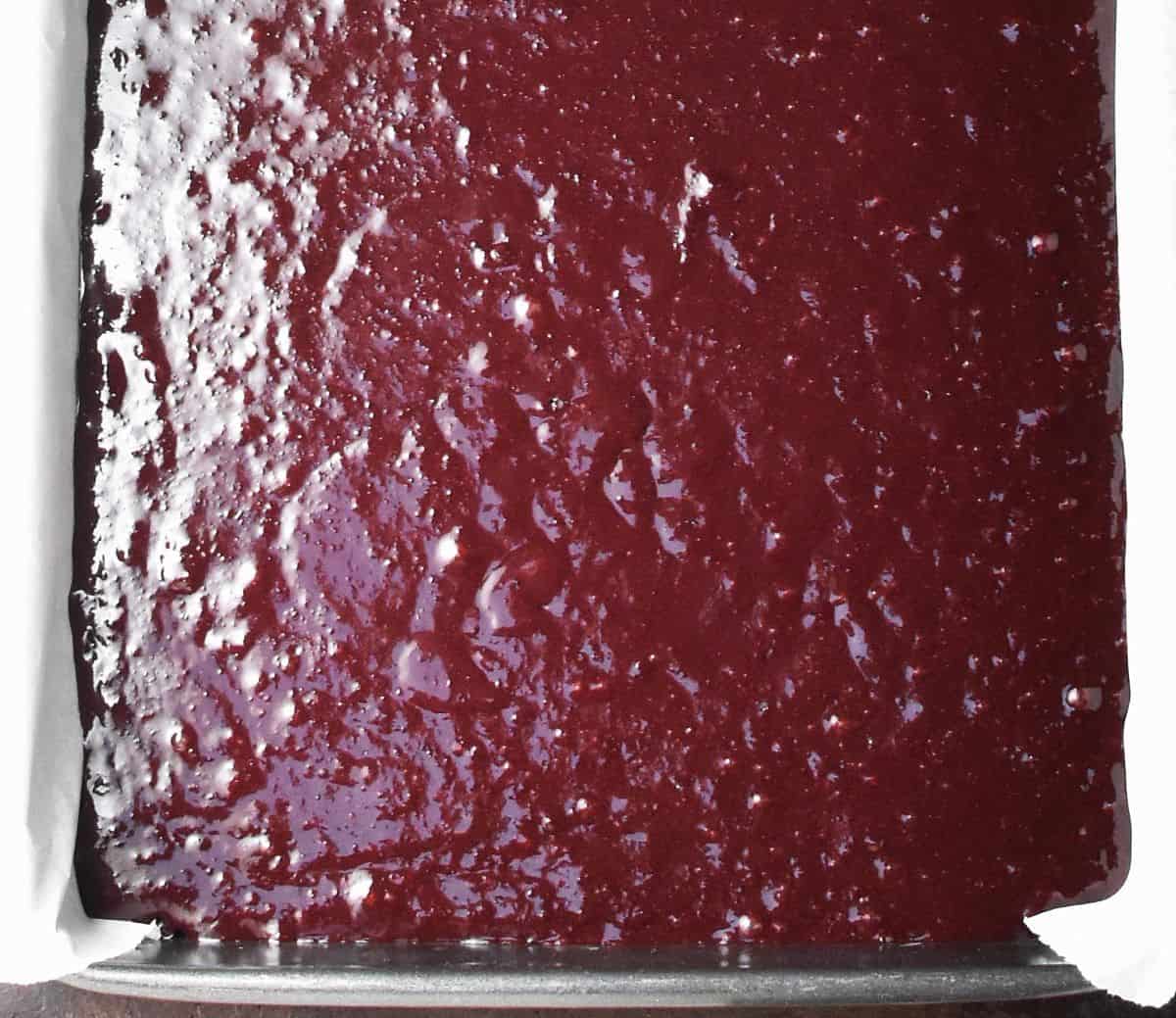 Beet brownie cake batter in pan.