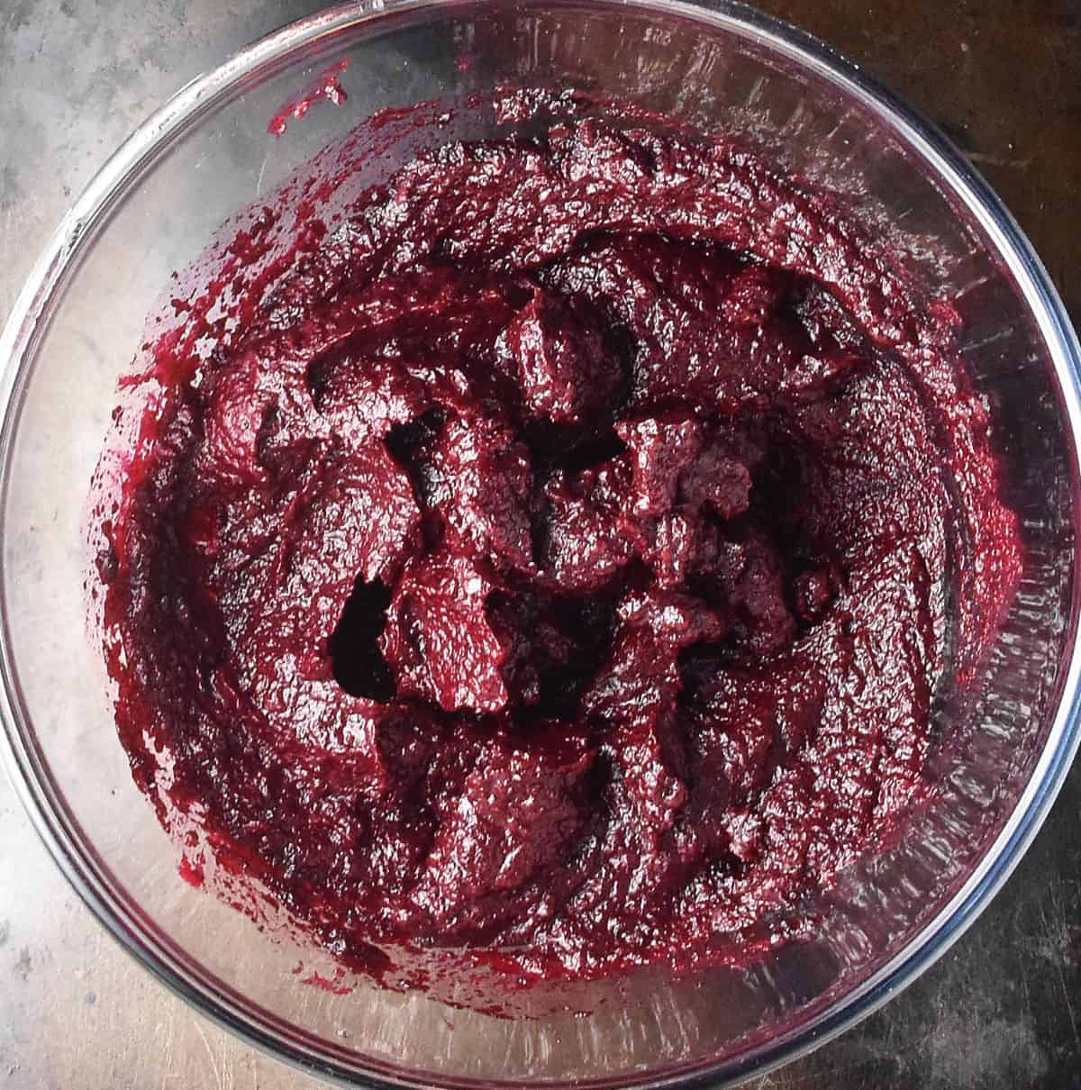 Pureed beet mixture in large glass bowl.