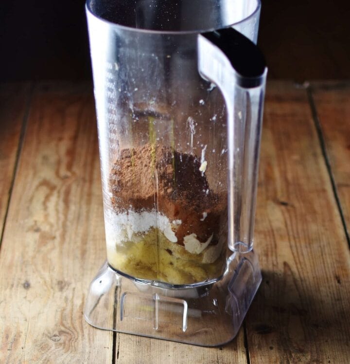 Mashed banana, cocoa powder and sugar in blender.