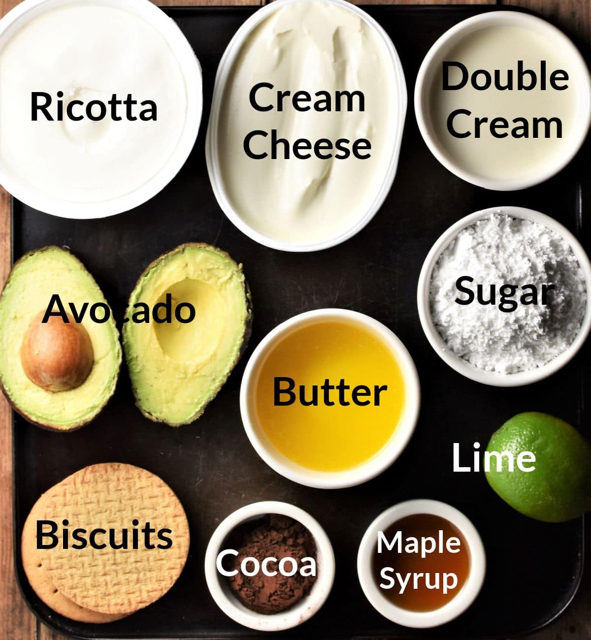 Ingredients for making avocado cheesecake in individual dishes.