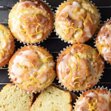 Top down view of marzipan muffins with lemon glaze close together.