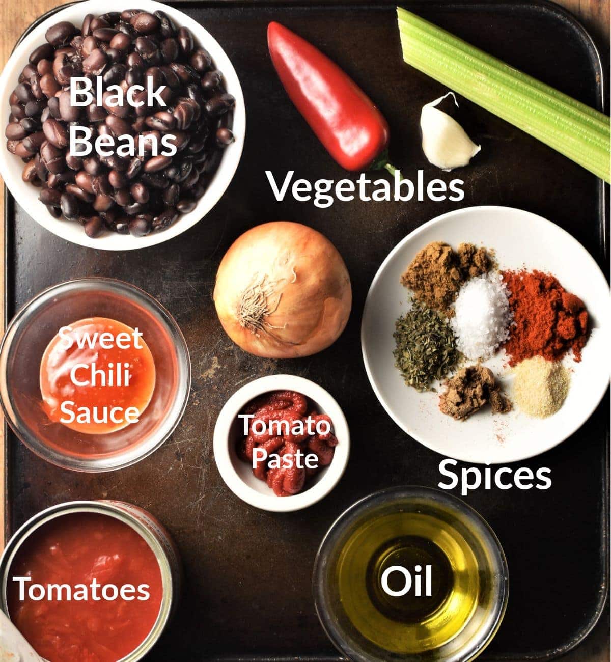 Mexican black bean stew ingredients in individual dishes.