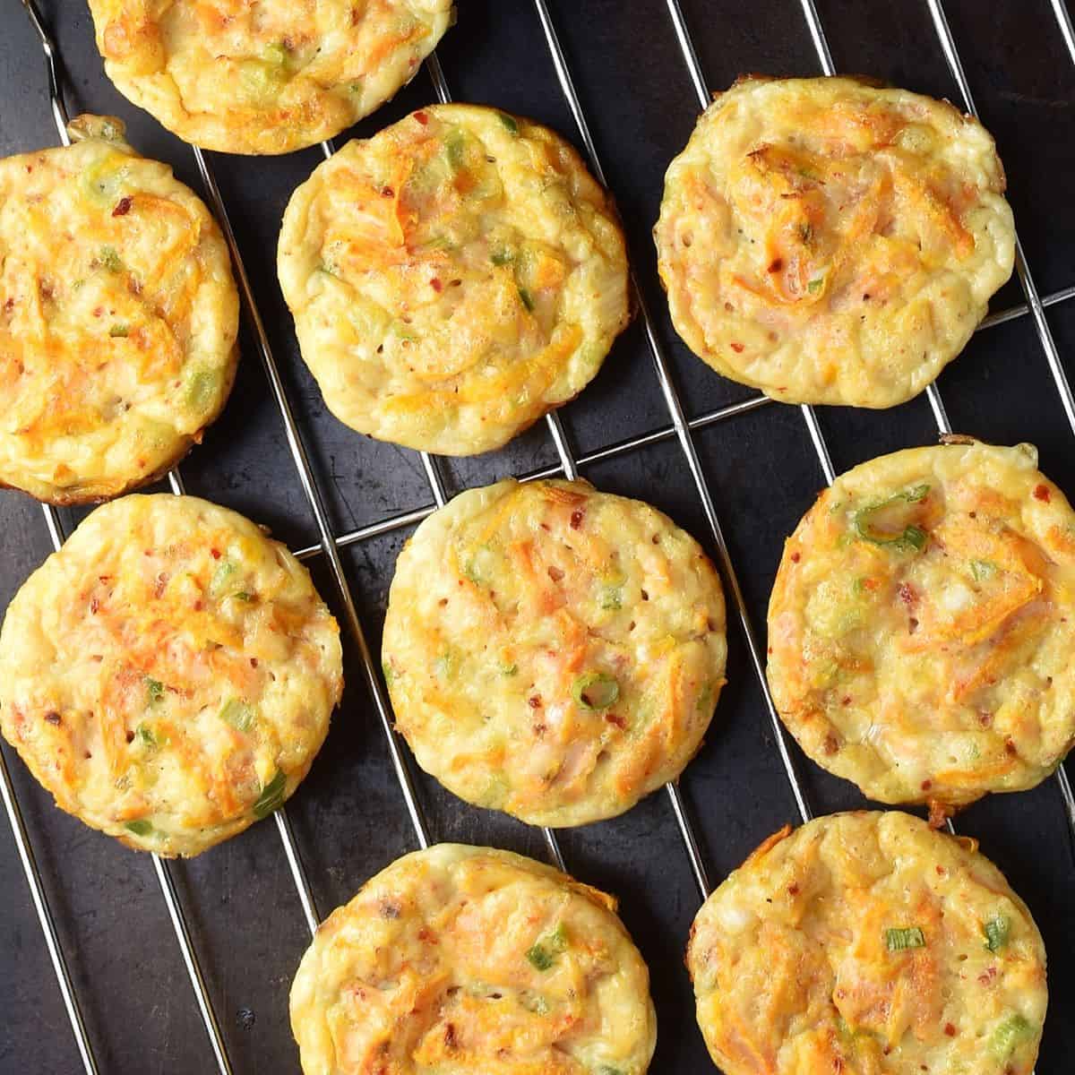 Top down view of sweet potato egg muffins on rack.