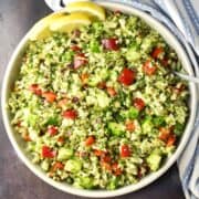 Top down view of cauliflower tabbouleh salad in large bowl.