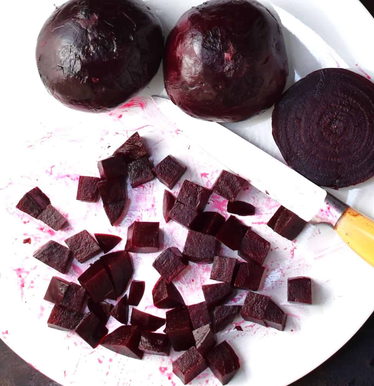 Preparing cooked beets for salsa.