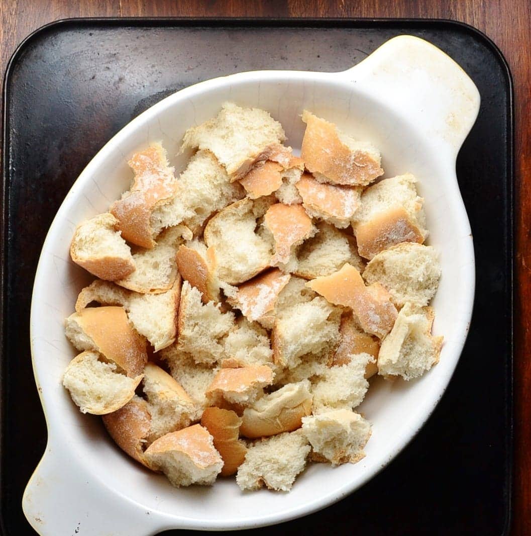 Roll pieces in white oval dish on top pf oven tray.