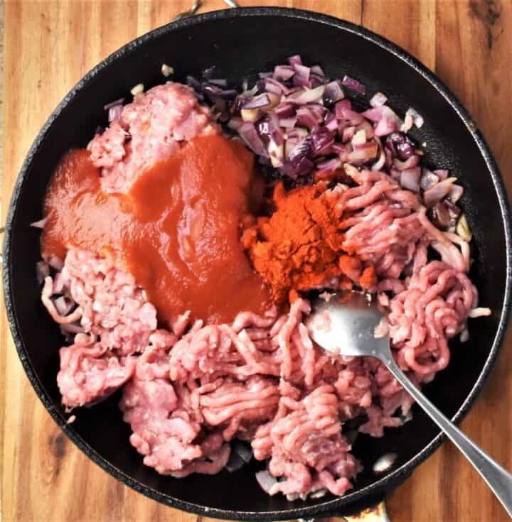 Making ground turkey filling mixture for stuffed peppers.