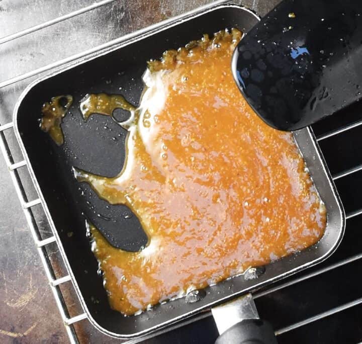 Top down view of miso paste glaze in square pan.