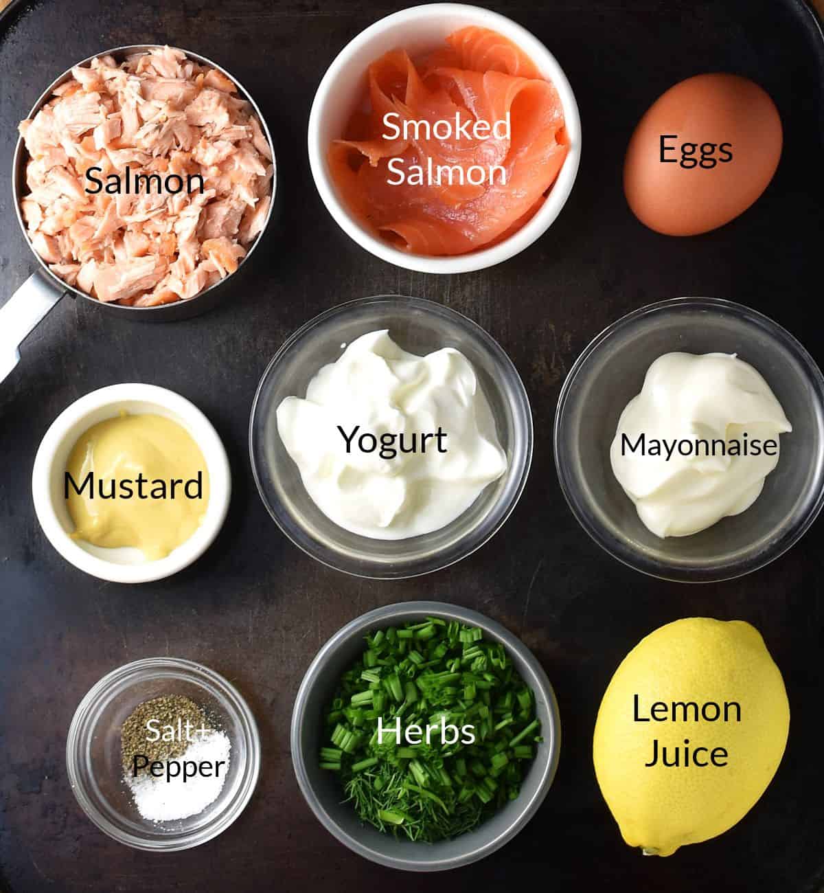 Ingredients for making salmon and egg salad in individual dishes.