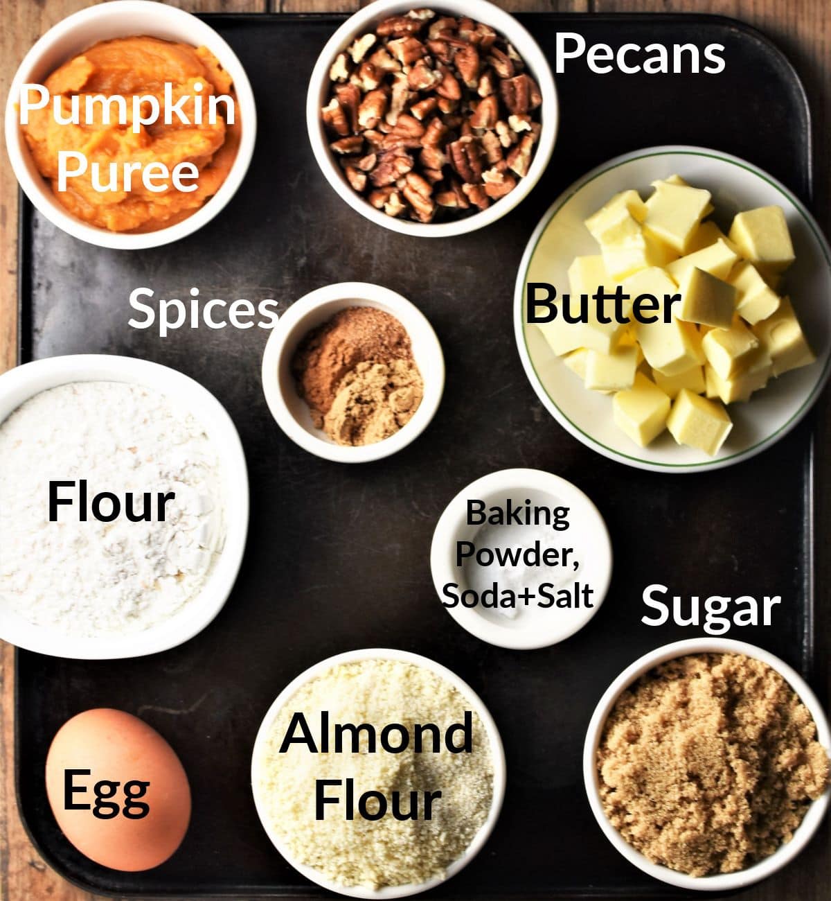 Pumpkin cookies ingredients in individual dishes.