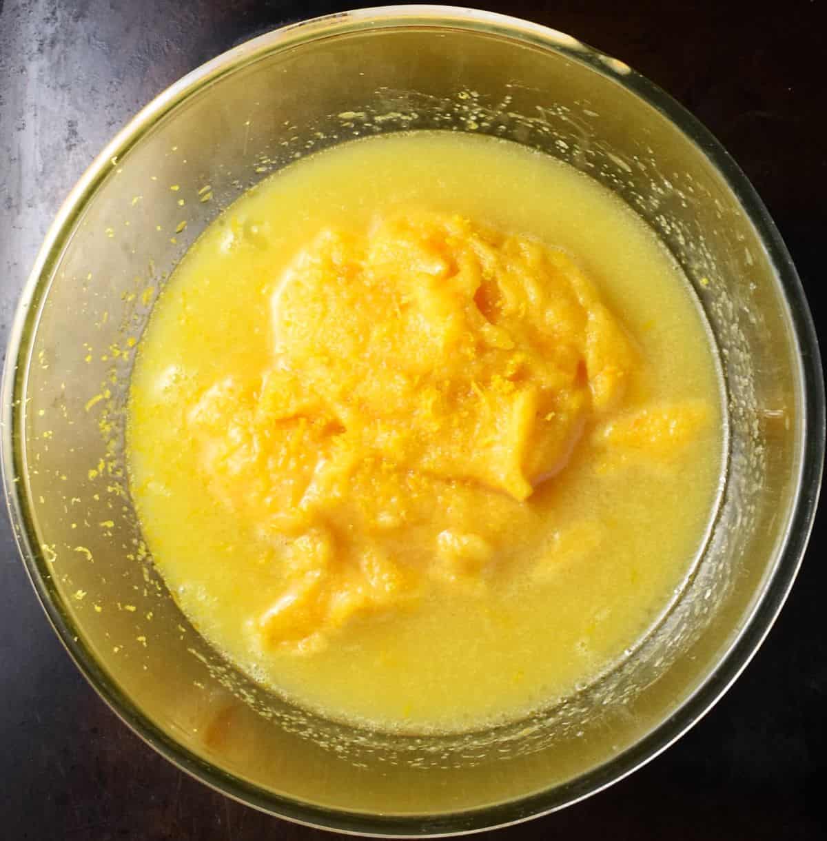 Top down view of pureed persimmon in batter.