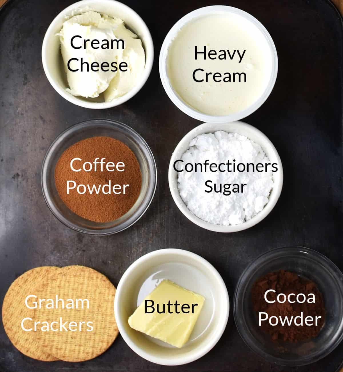 Top down view of ingredients for no-bake coffee cheesecake in individual dishes.