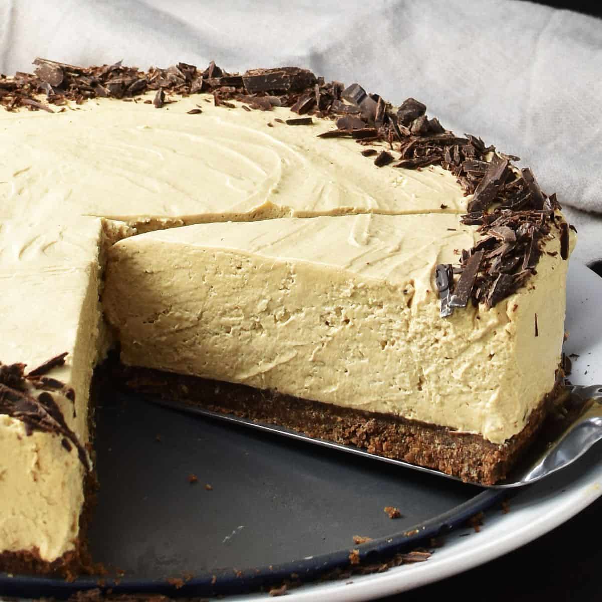 Side view of coffee cheesecake slice.