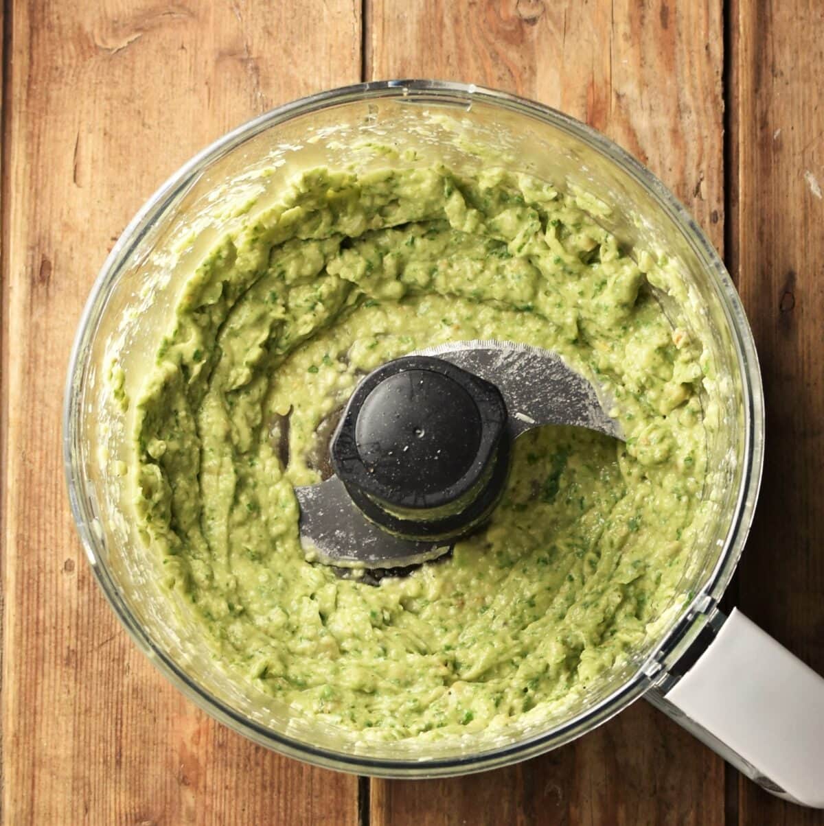 Creamy avocado pesto in blender.