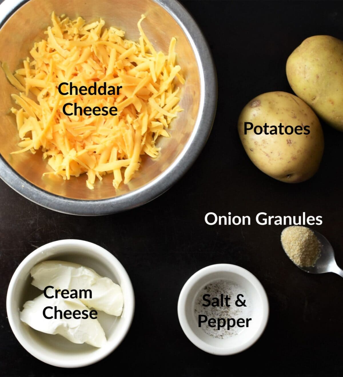 Pierogi filling ingredients in separate dishes.