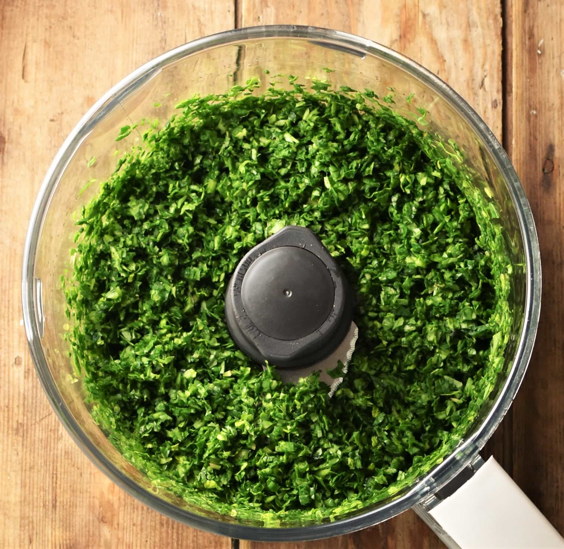 Chopped spinach mixture in blender.