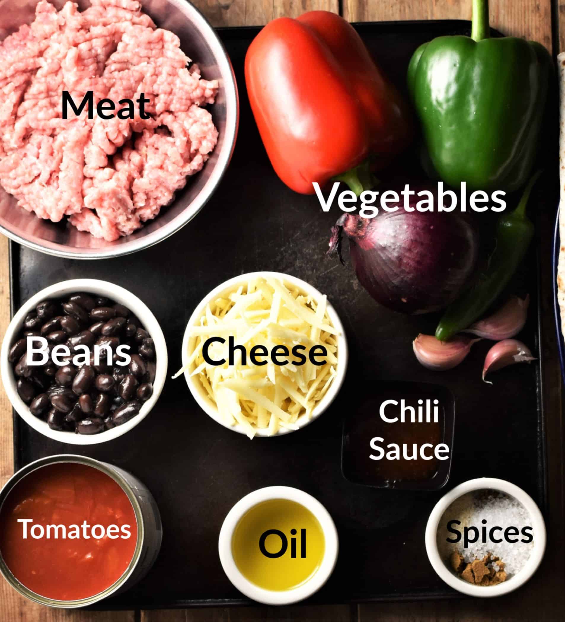 Tortilla bake ingredients in individual dishes.