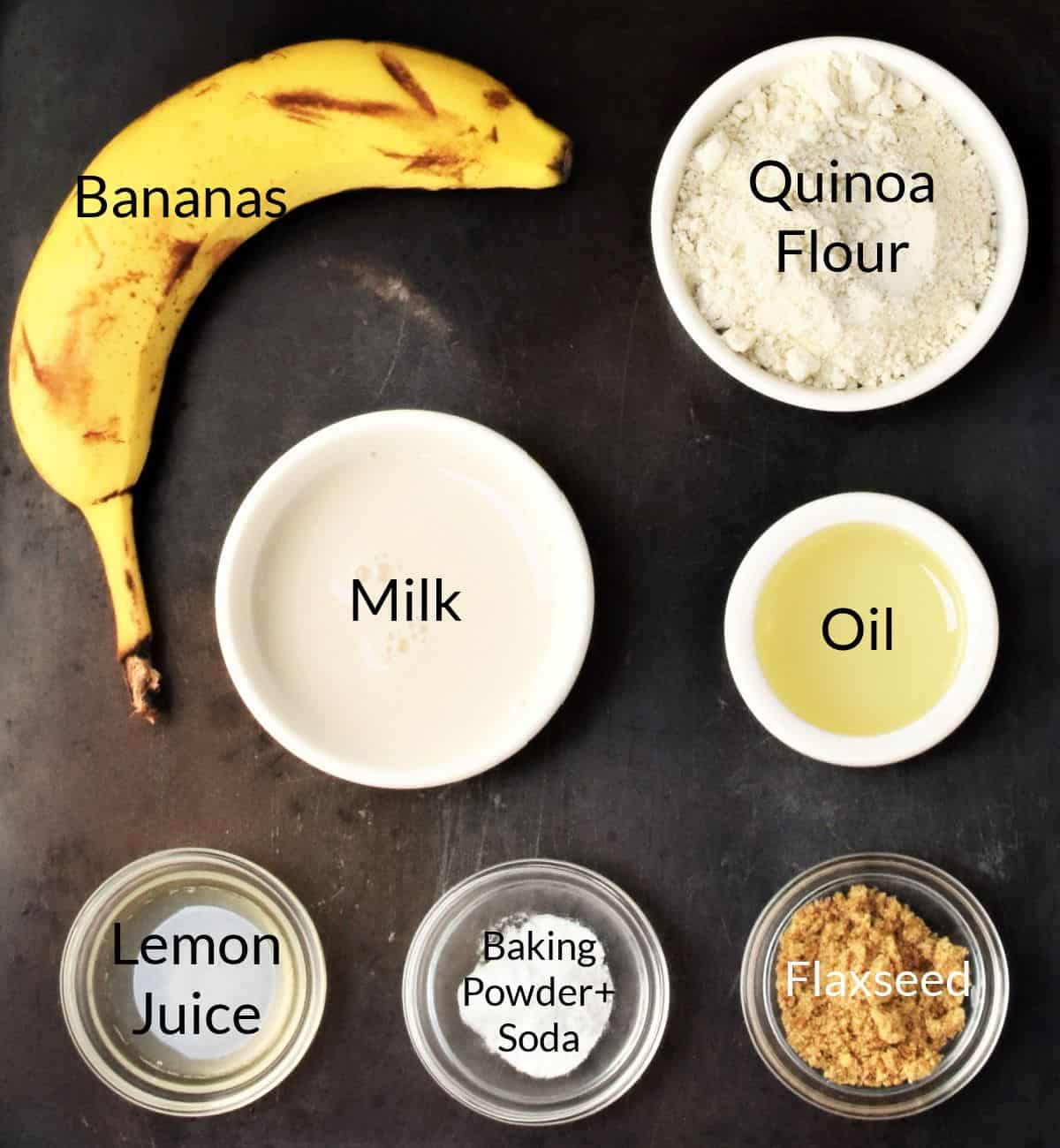 Ingredients for making quinoa pancakes in individual dishes.