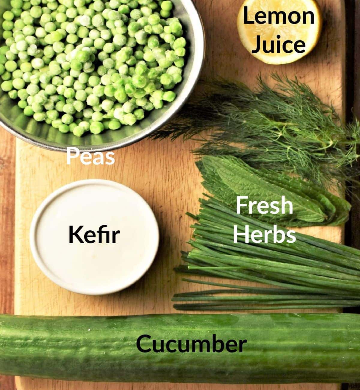 Cold cucumber soup ingredients in individual dishes.