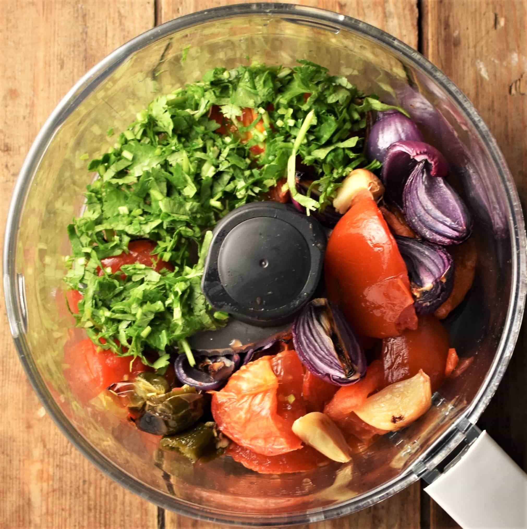 Chopped herbs, tomatoes, red onions and garlic.