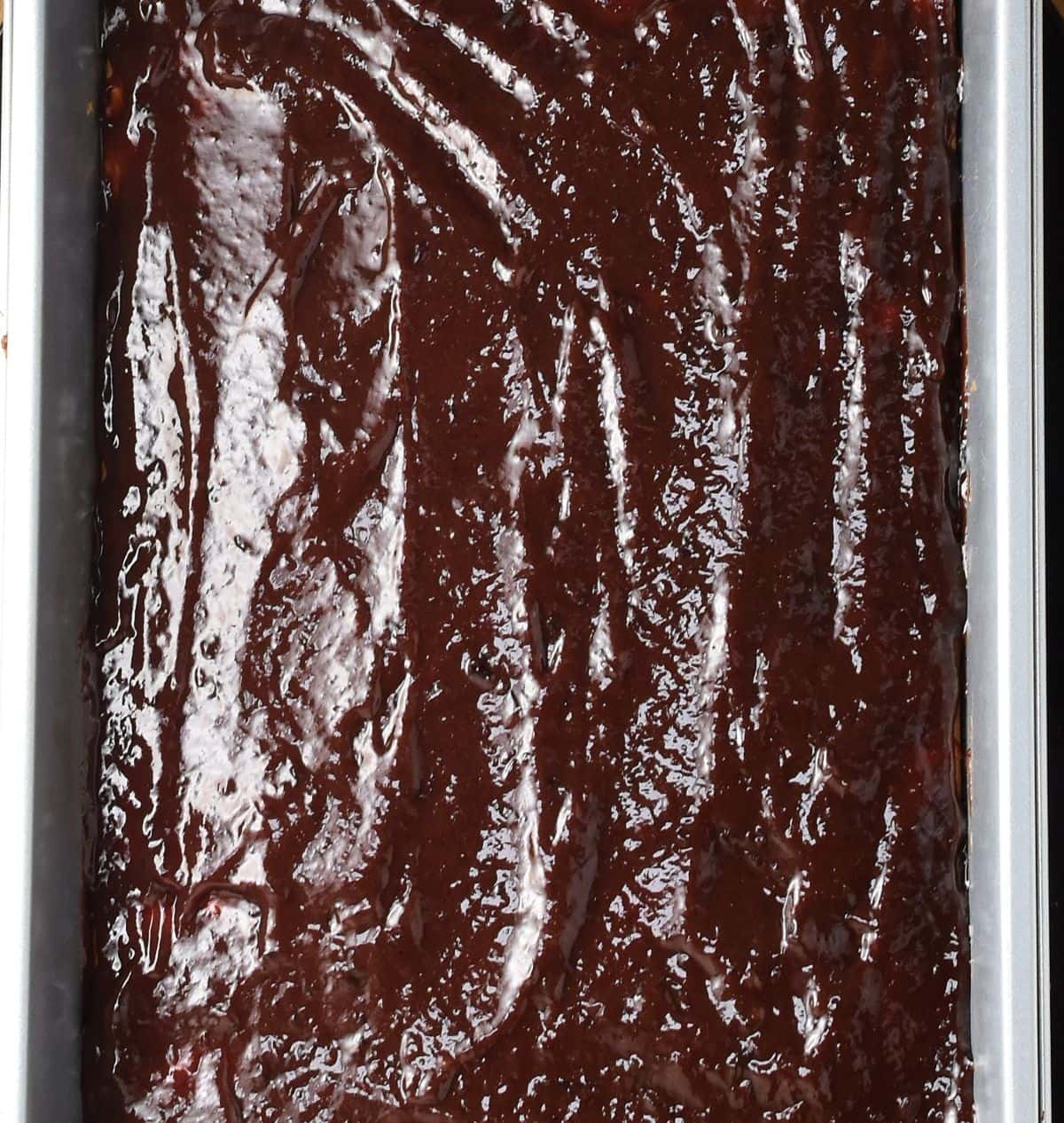 Fruit mixture layer in rectangular pan.