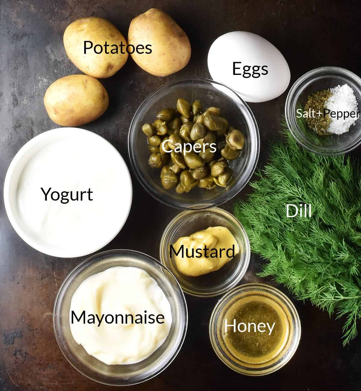 Ingredients for making potato and dill salad in individual dishes.