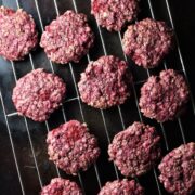Raspberry cookies on top of rack.