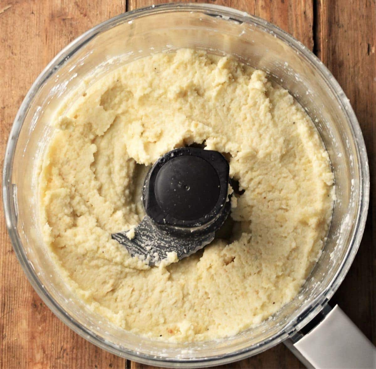 Celeriac mash in food processor bowl.