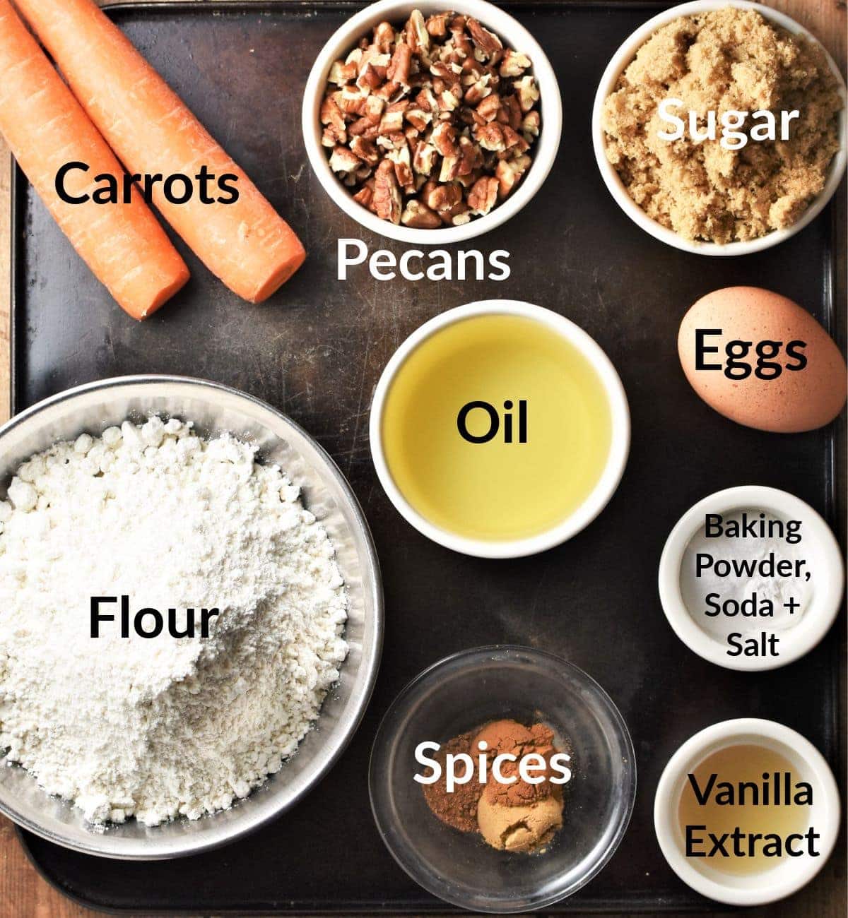 Low sugar carrot cake ingredients in individual dishes.