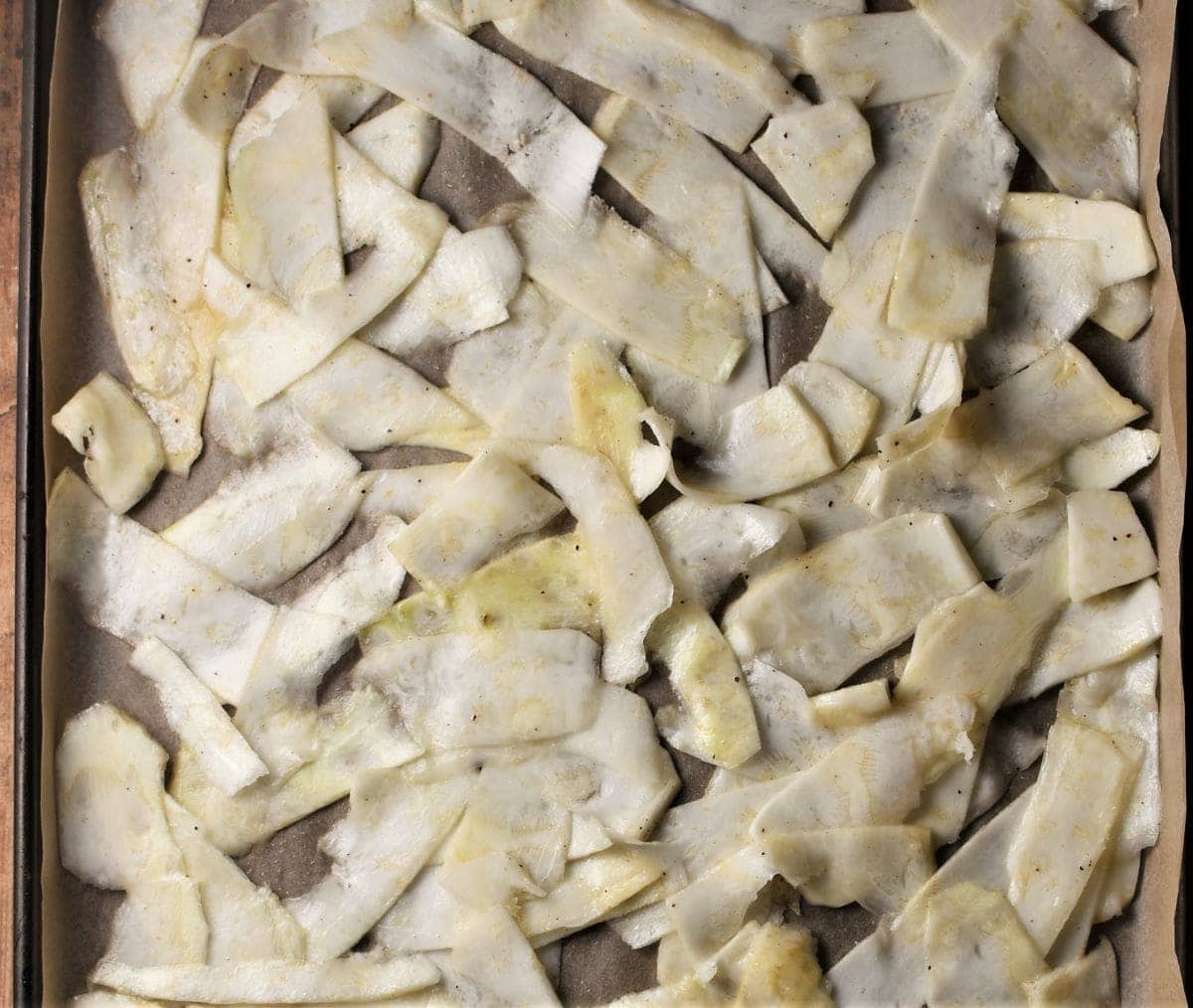 Celery root shavings on top of parchment